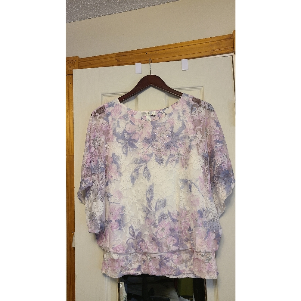 Pastel colored, floral patterned butterfly sleeve top